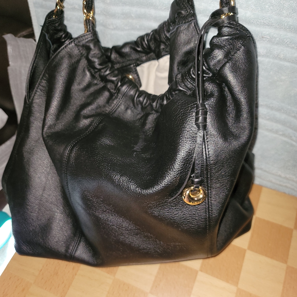 Black Leather Hobo Bag with Gold Accents